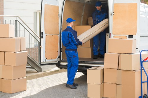 Staff ensuring safe access and tidy storage area