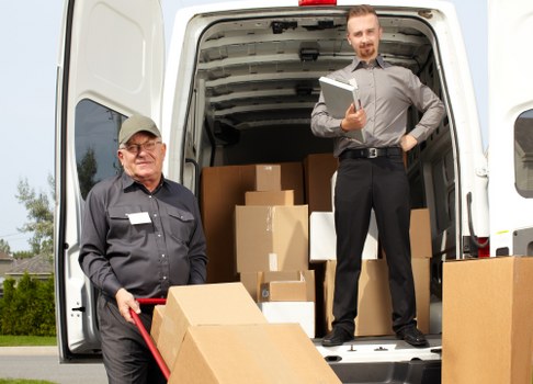 Storage team sorting recyclable packaging at Roehampton Storage