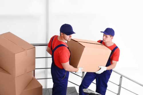 Packed boxes and household items stored in a Roehampton storage unit