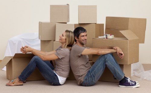 Boxes and stored household items in Roehampton storage space
