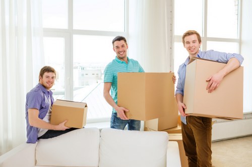 Organised storage space in Roehampton with stacked boxes and furniture