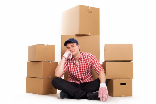 Professional movers handling furniture during a small relocation